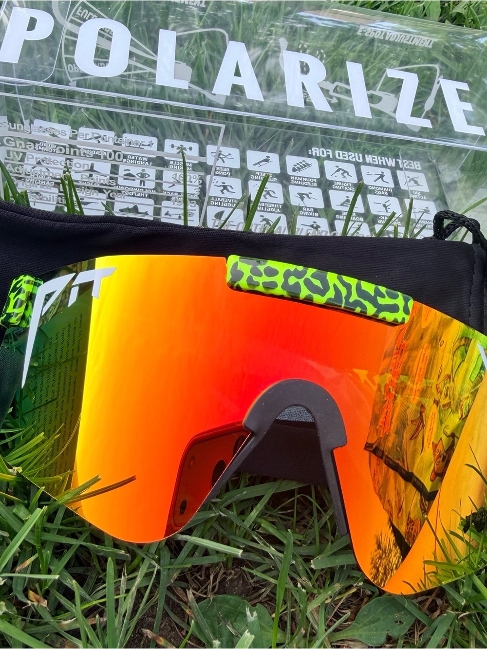 Pit Viper Neon Green Accent Shield Goggles with Red-Orange Mirrored Lens